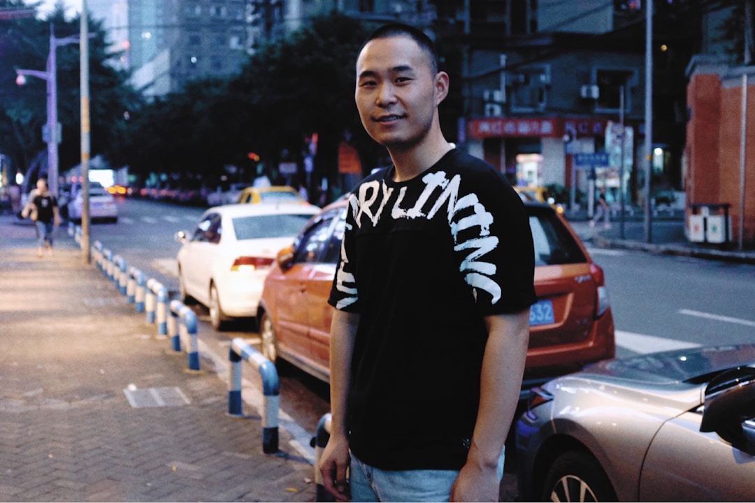 A confident man standing on a city street, representing bold faith in public spaces